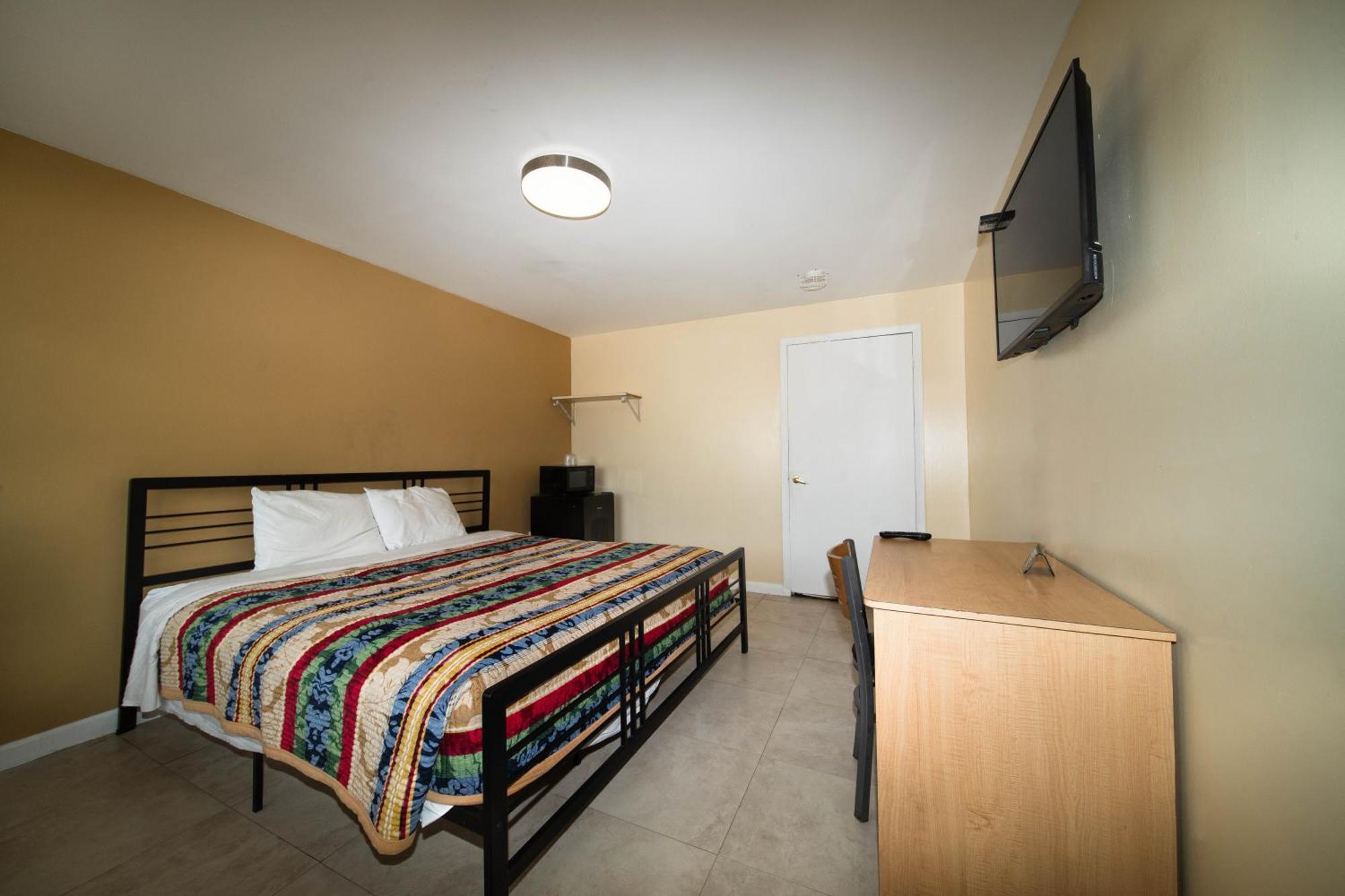 Kamer met Kingsize Bed - Geschikt voor Gasten met een Lichamelijke Beperking