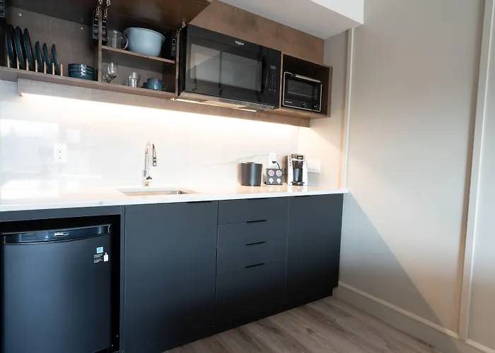 &Suites Normandin